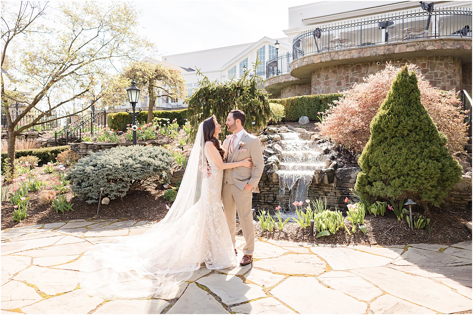 bride and groom hug in garden at Park Savoy Estate