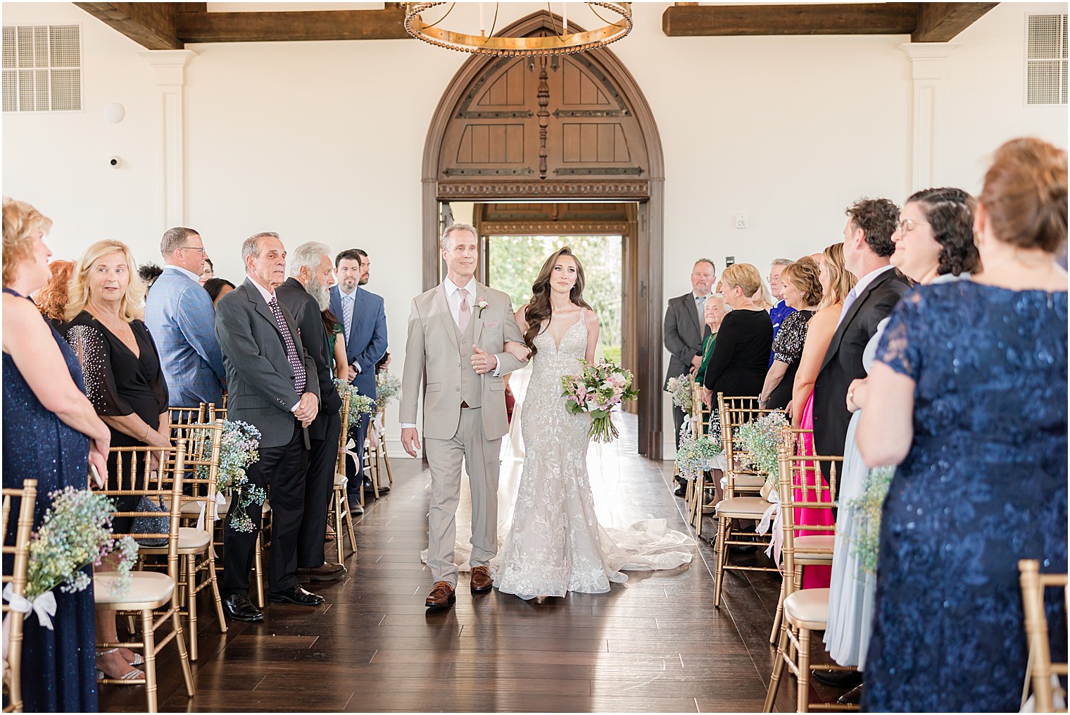 bride and father enter wedding ceremony in Park Savoy Estate chapel