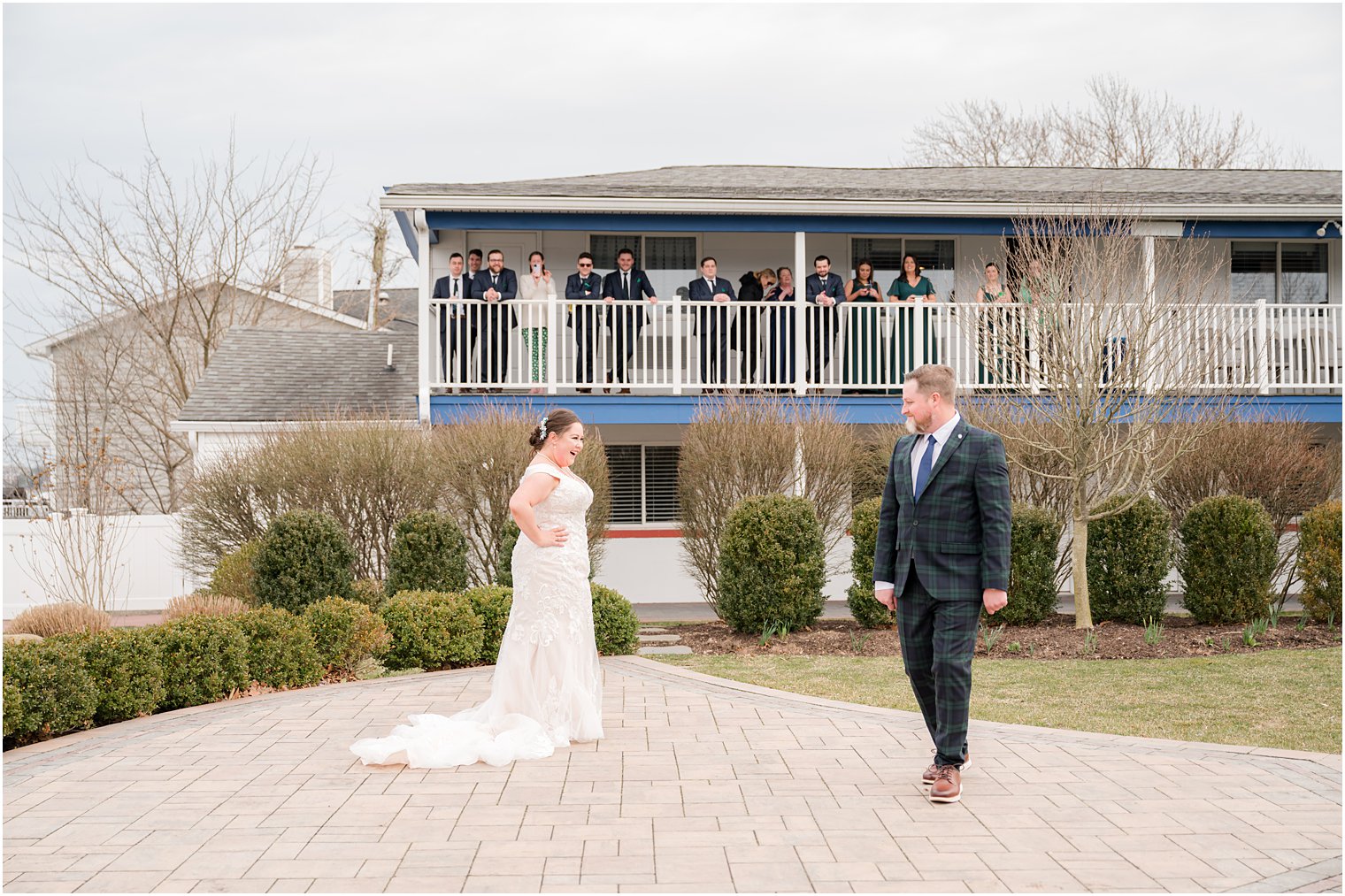 bride and groom look at each other during first look