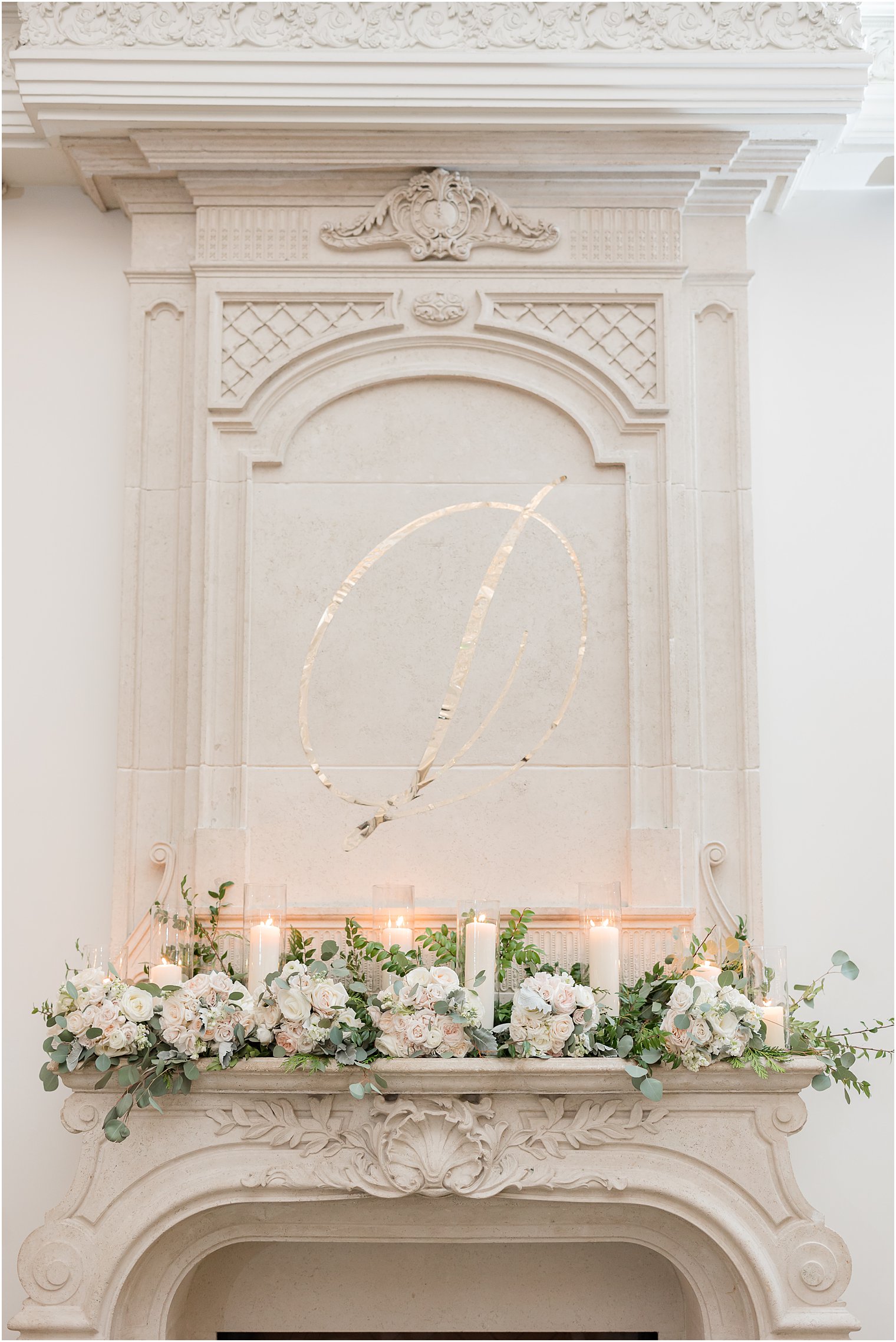 flowers lay on mantel of fireplace at Park Chateau Estate