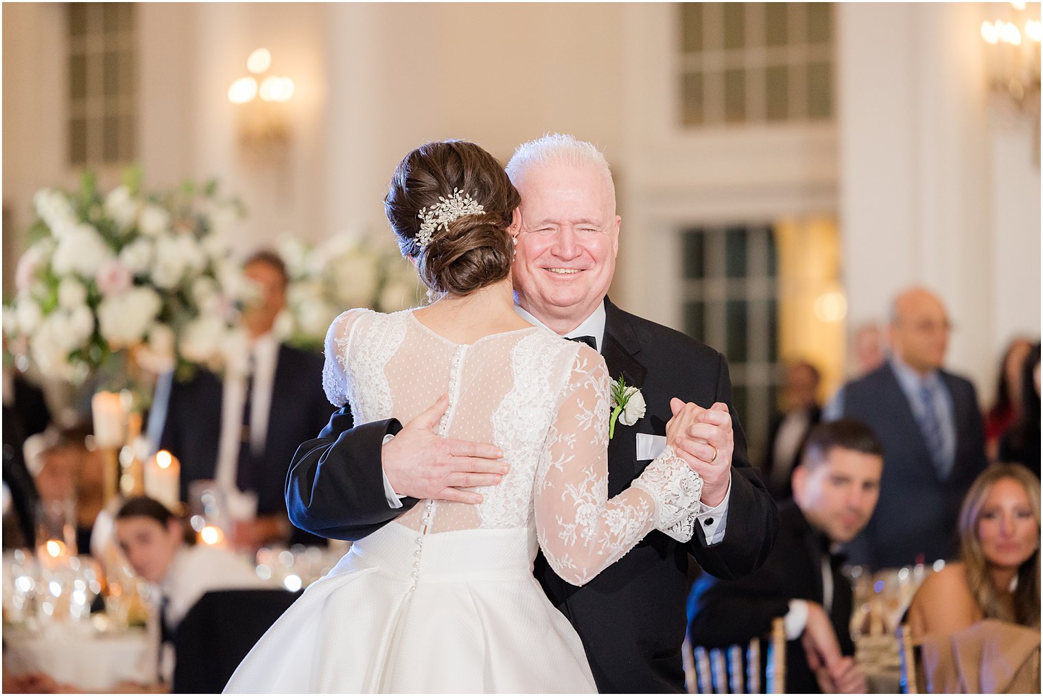 dad grins dancing with bride during NJ wedding reception 