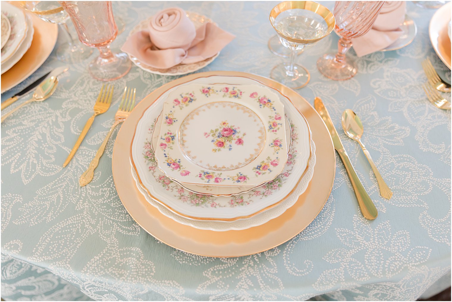 place setting with china plates stacked at Mallard Island Yacht Club