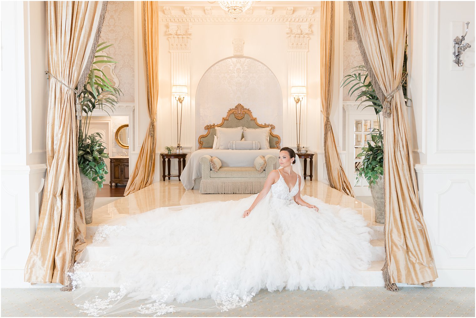 bride sits on bench at end of bed at Mallard Island Yacht Club