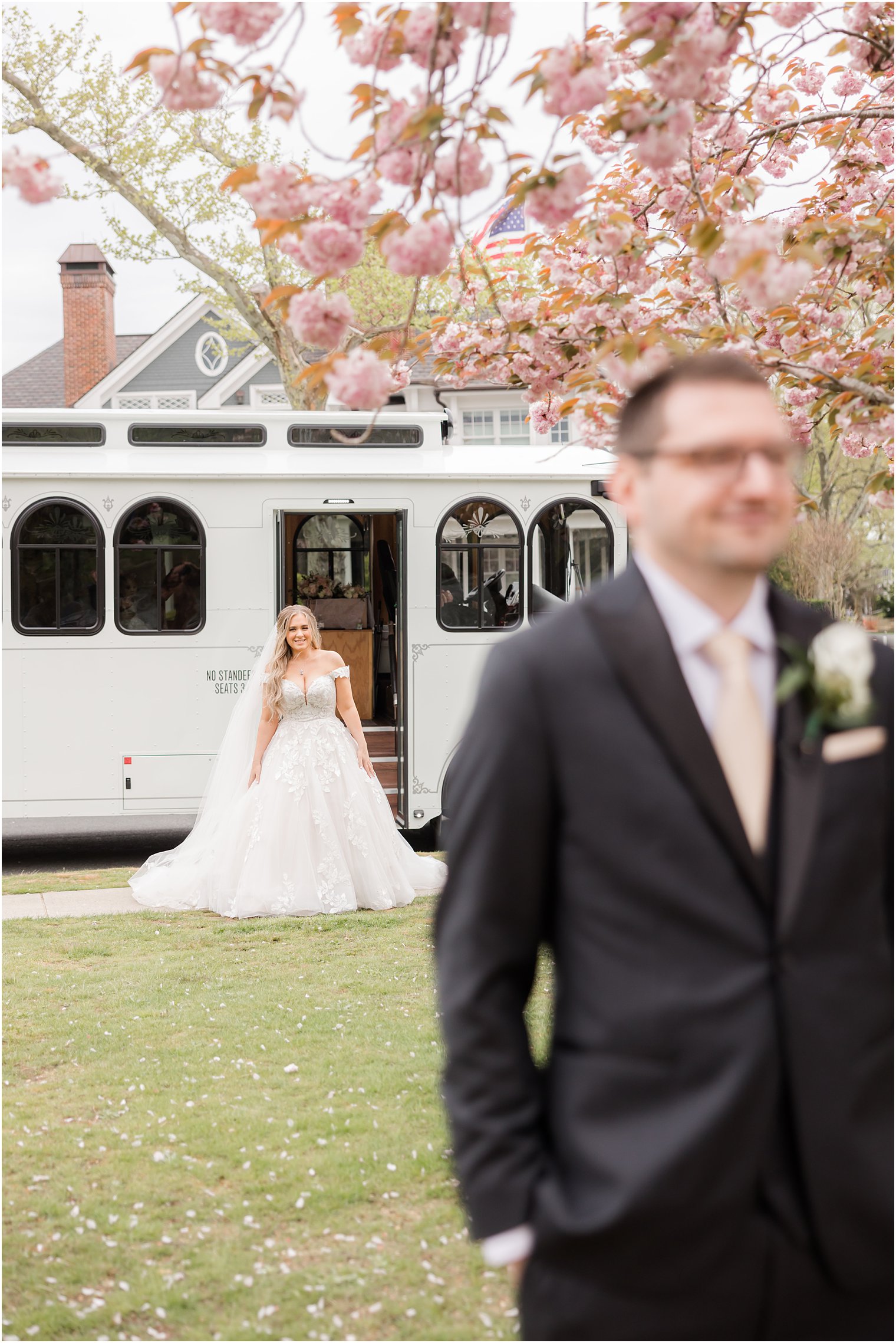 bride leaves white trolley for first look in Divine Park in Spring Lake NJ