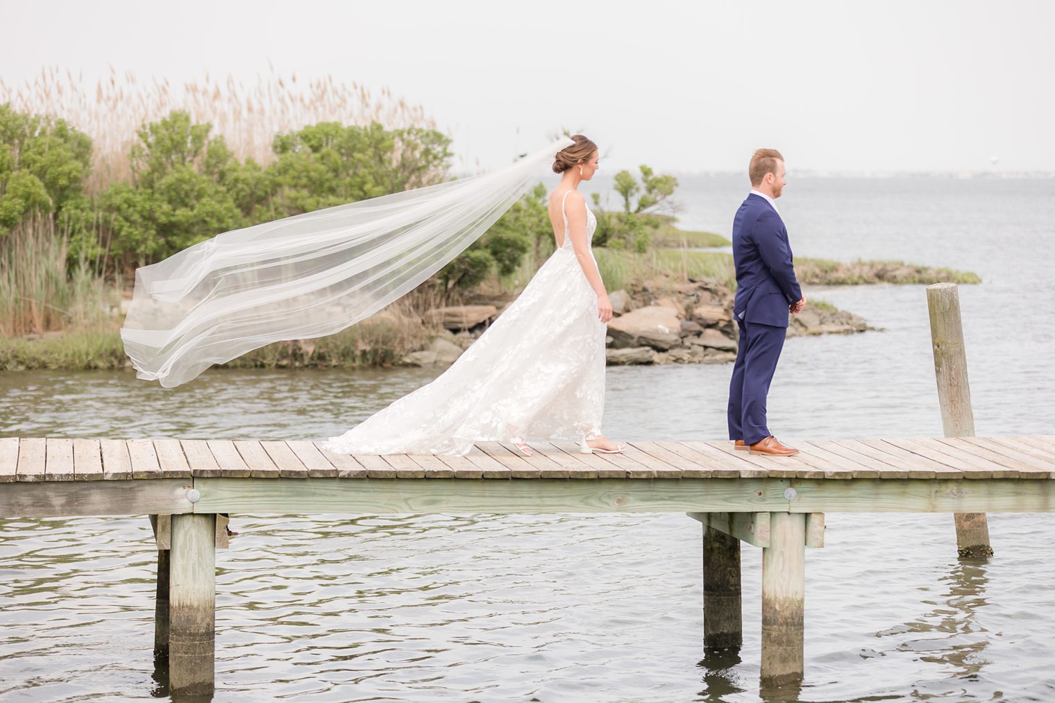 Bride walking to her future husband to share their first look at Bonnet Island Estate