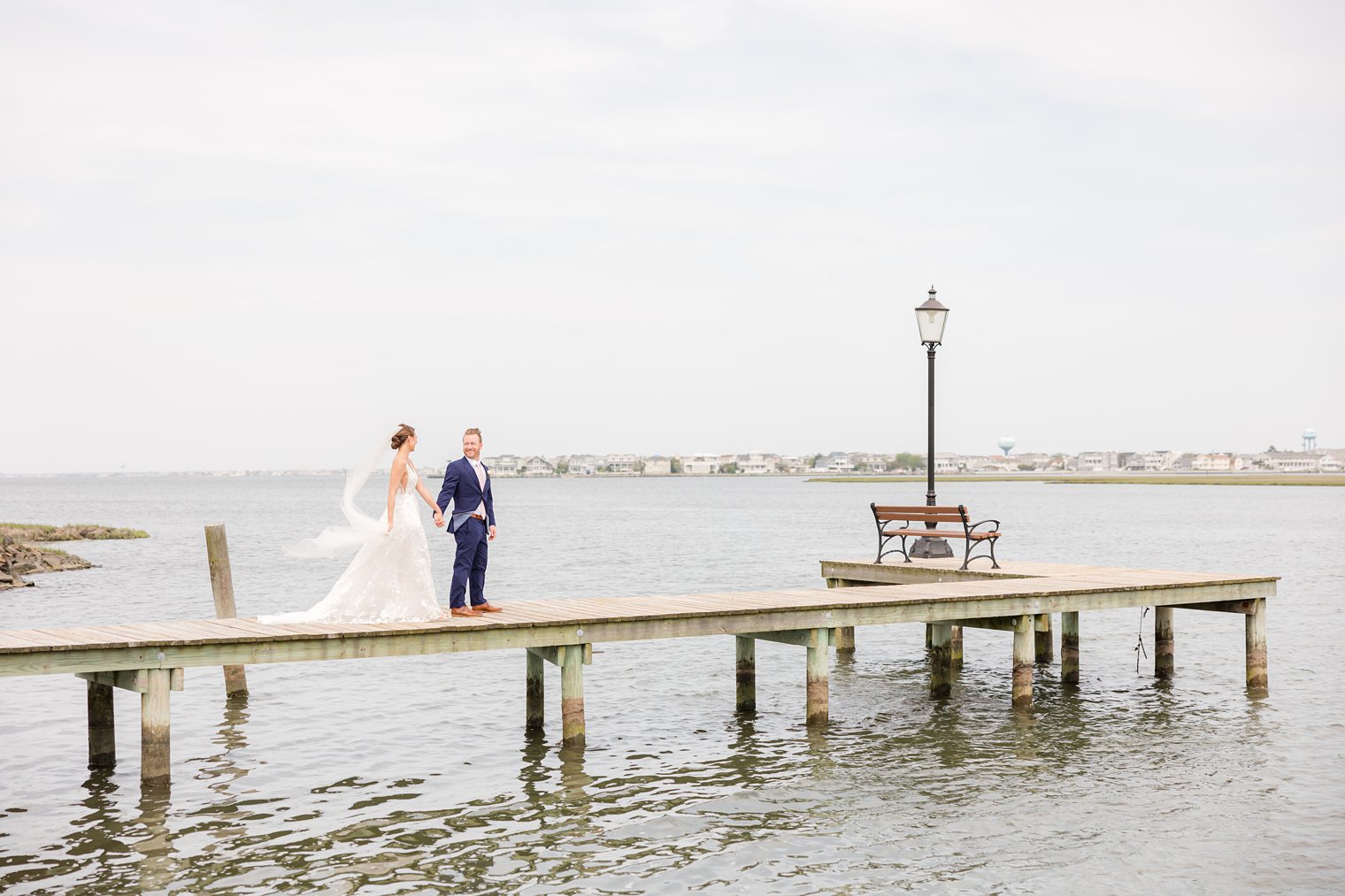 couple walking on the bridge at Bonnet Island Estate