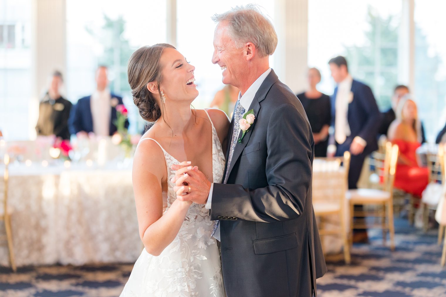 Bride happily dancing with her father at Bonnet Island Estate