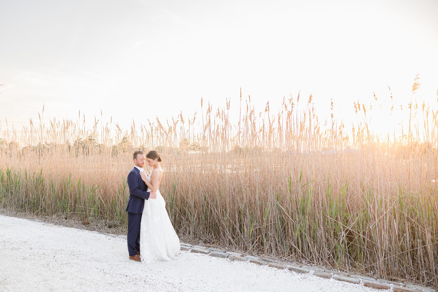 Couple being romantic their wedding at Bonnet Island Estate