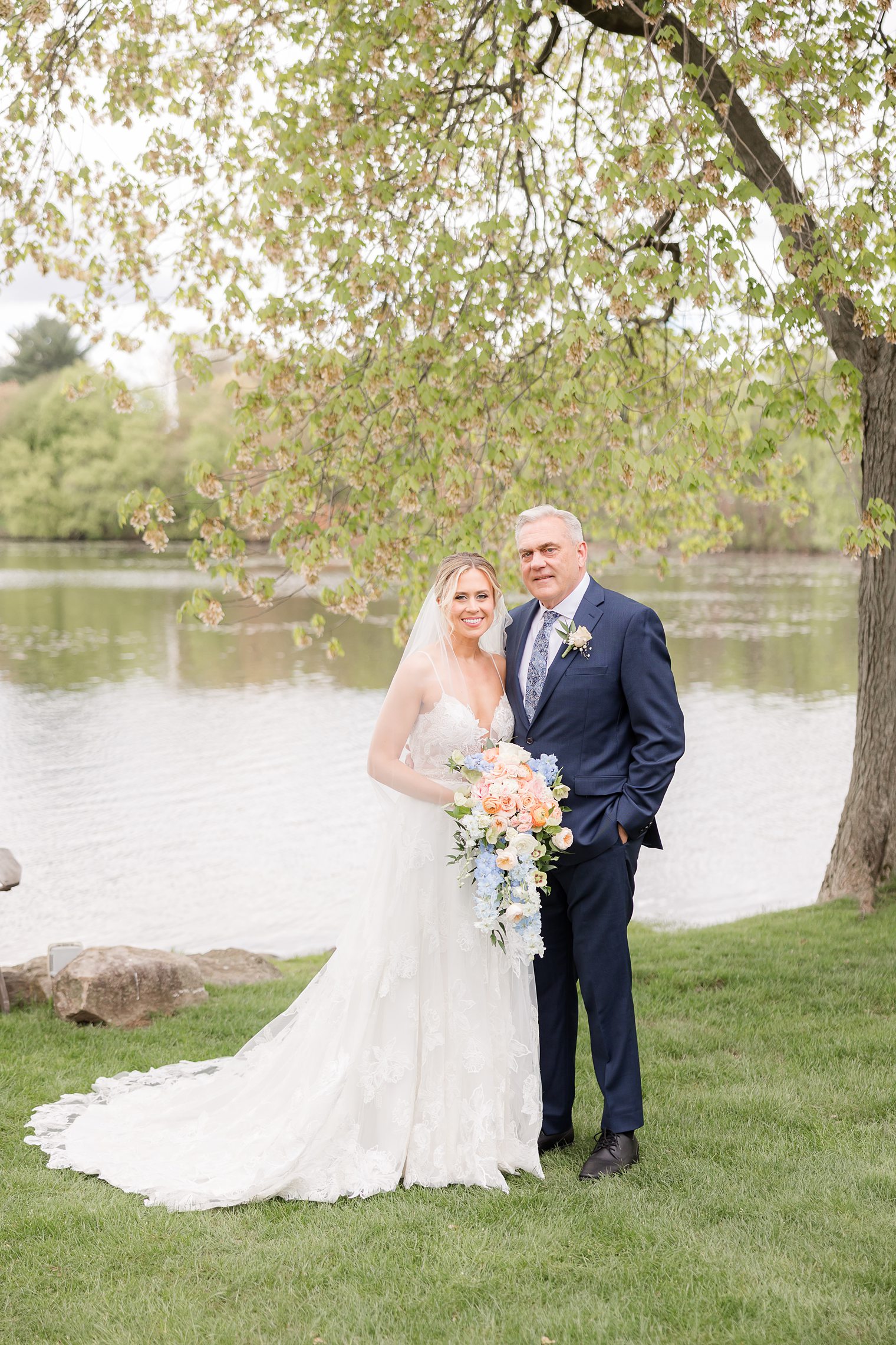 Father and Daughter posing after sharing their first look 