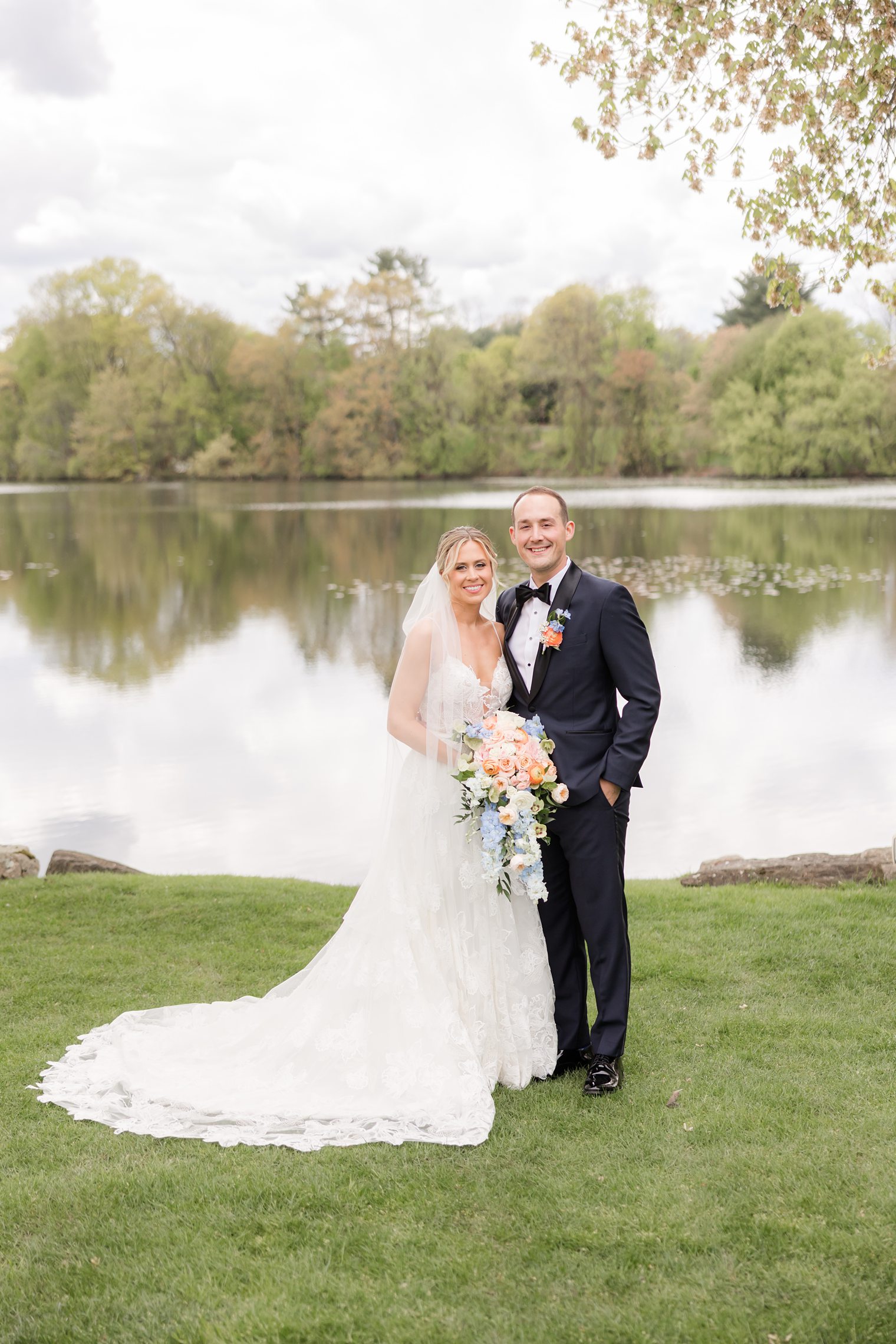 Couple sharing smiles after their first look as groom and bride at Indian Trail Club