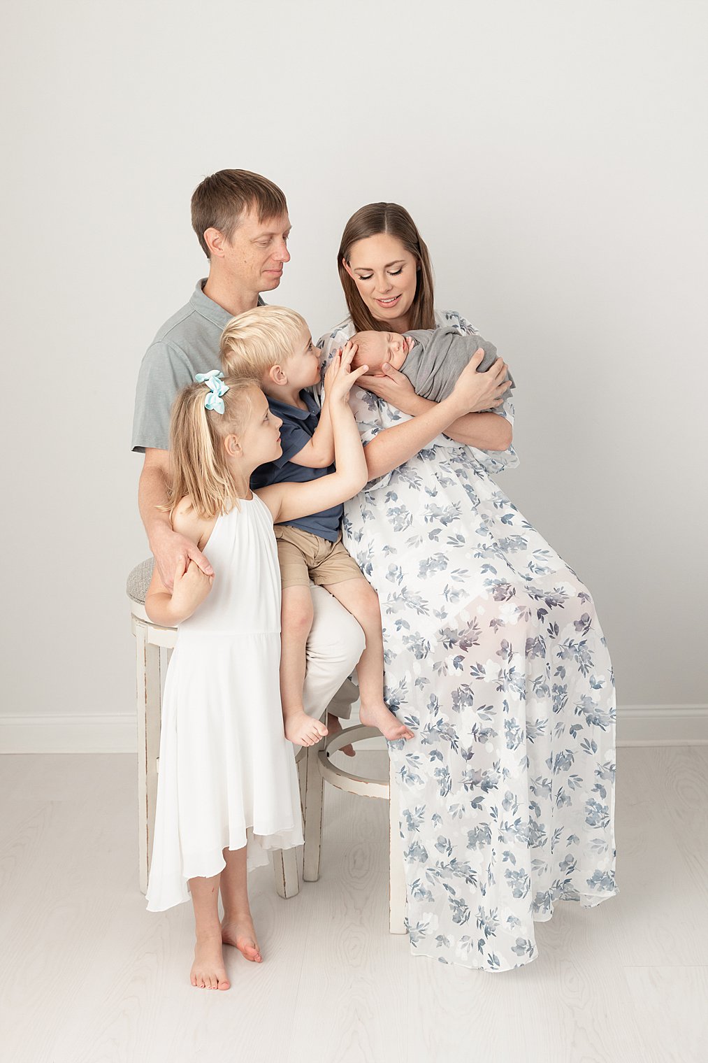 family of five during newborn session 