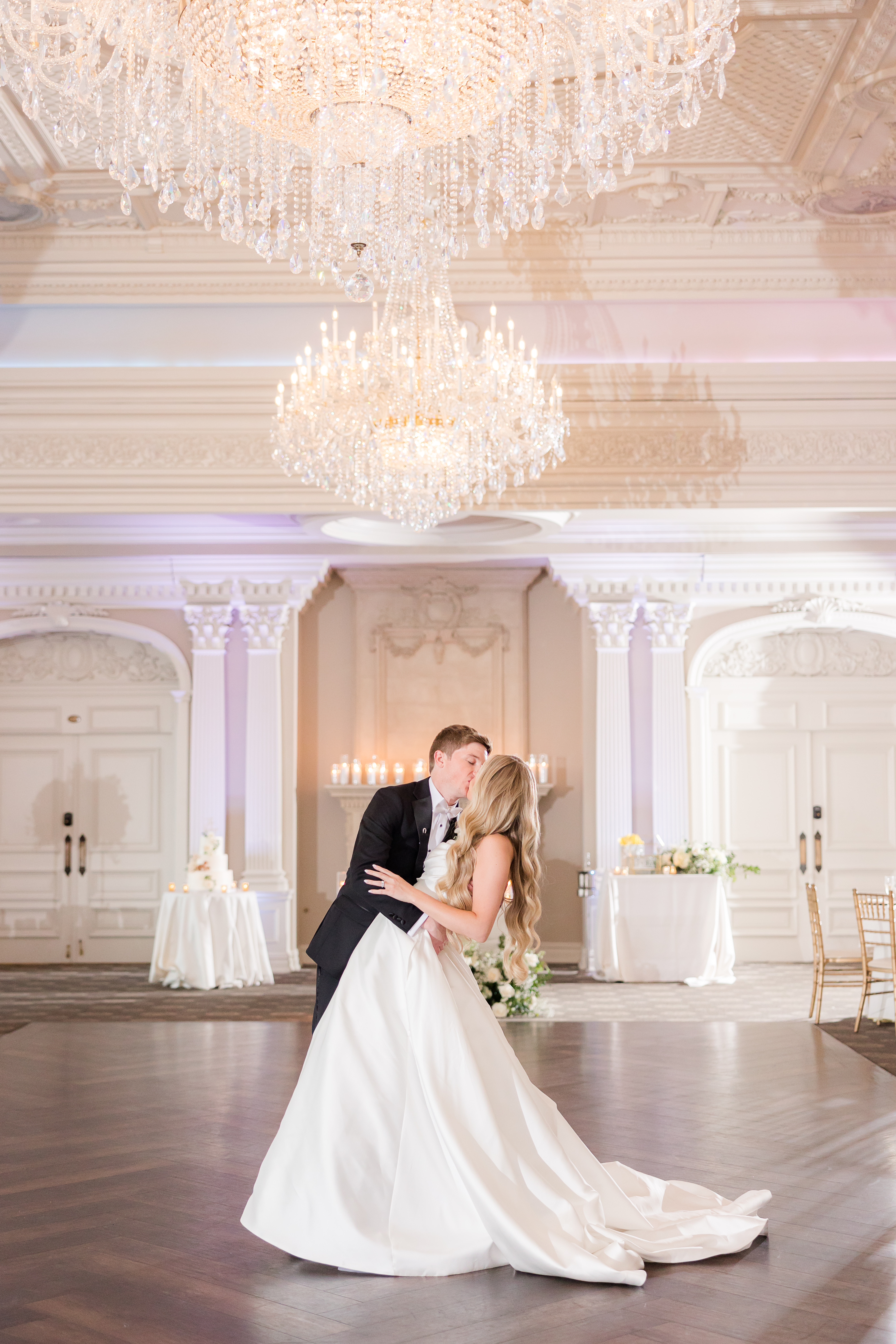 Husband and Wife kissing while sharing their first dance