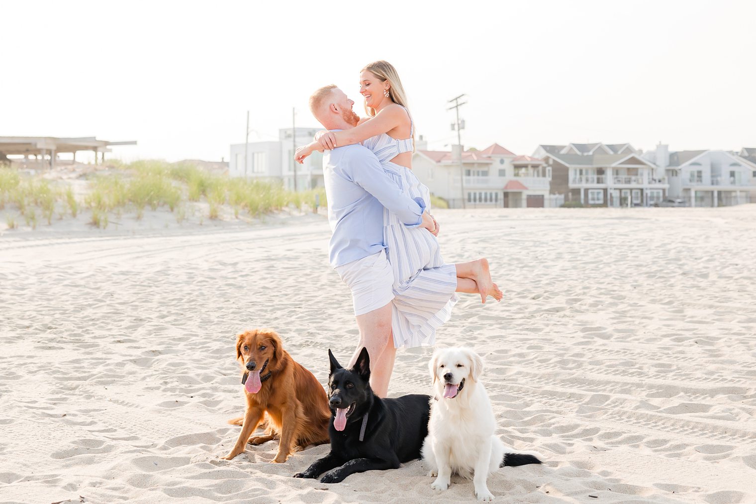 Fiancé holding up his bride 