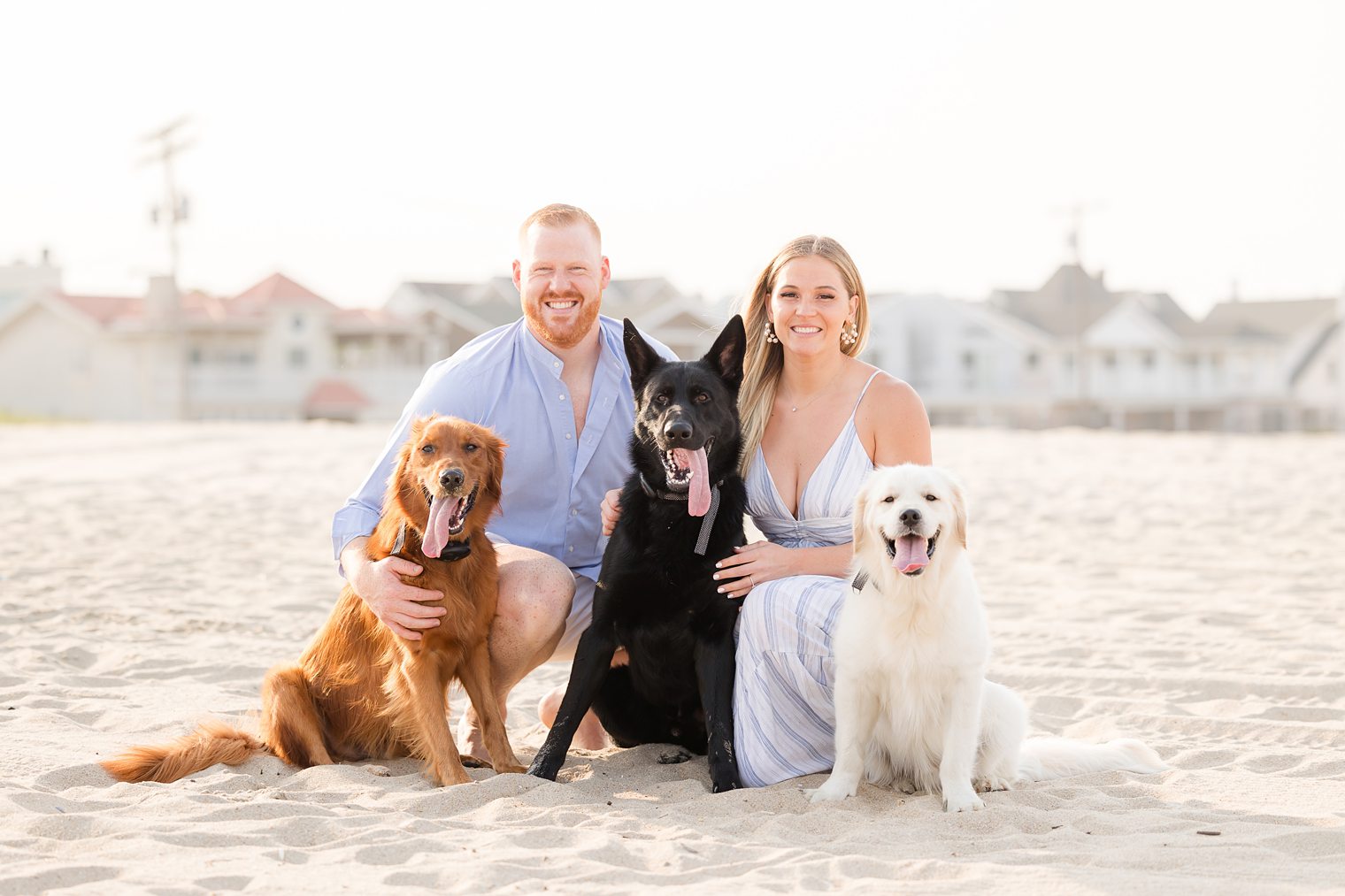 Future Mr and Mrs enjoying their beach day with their fur babies