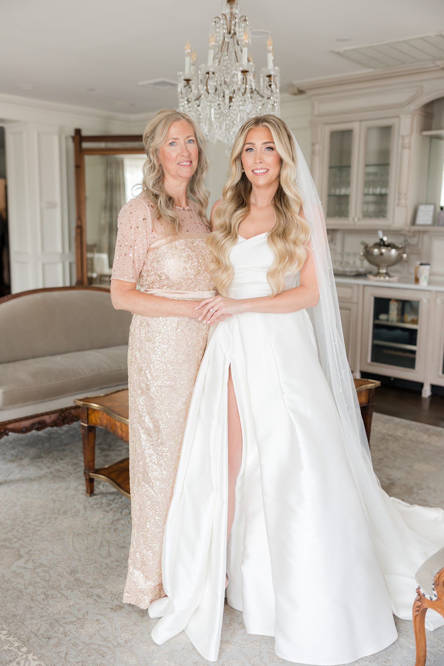 Bride and her mother posing for the wedding day at Park Savoy Estate