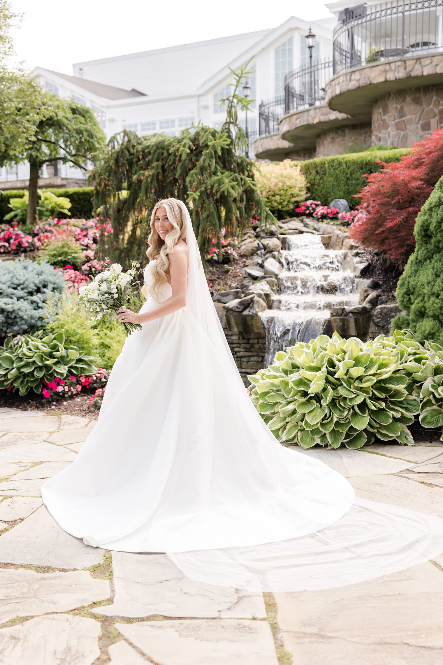 Beautiful bride showing her dress 