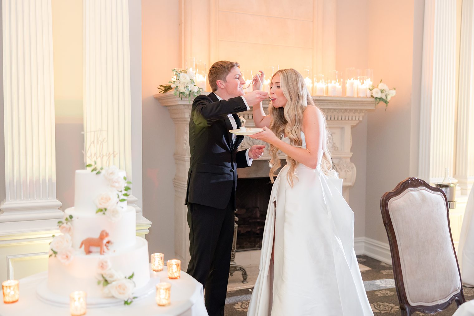 husband and wife sharing some wedding cake at park savoy estate