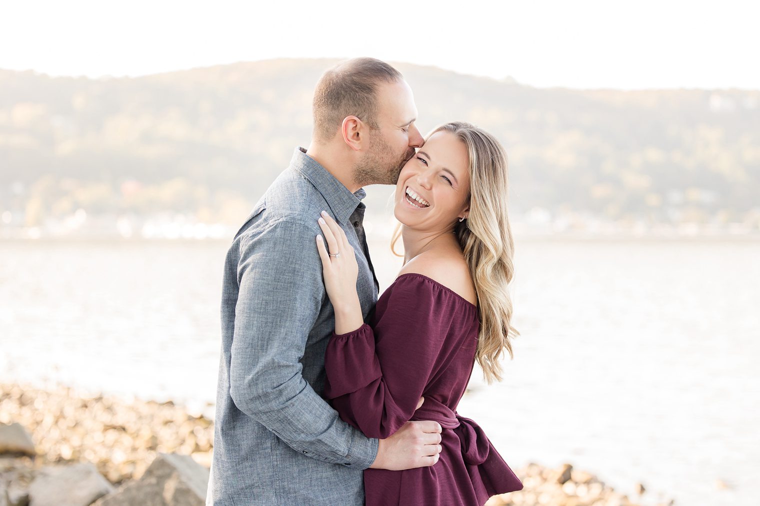 Future husband kissing his bride