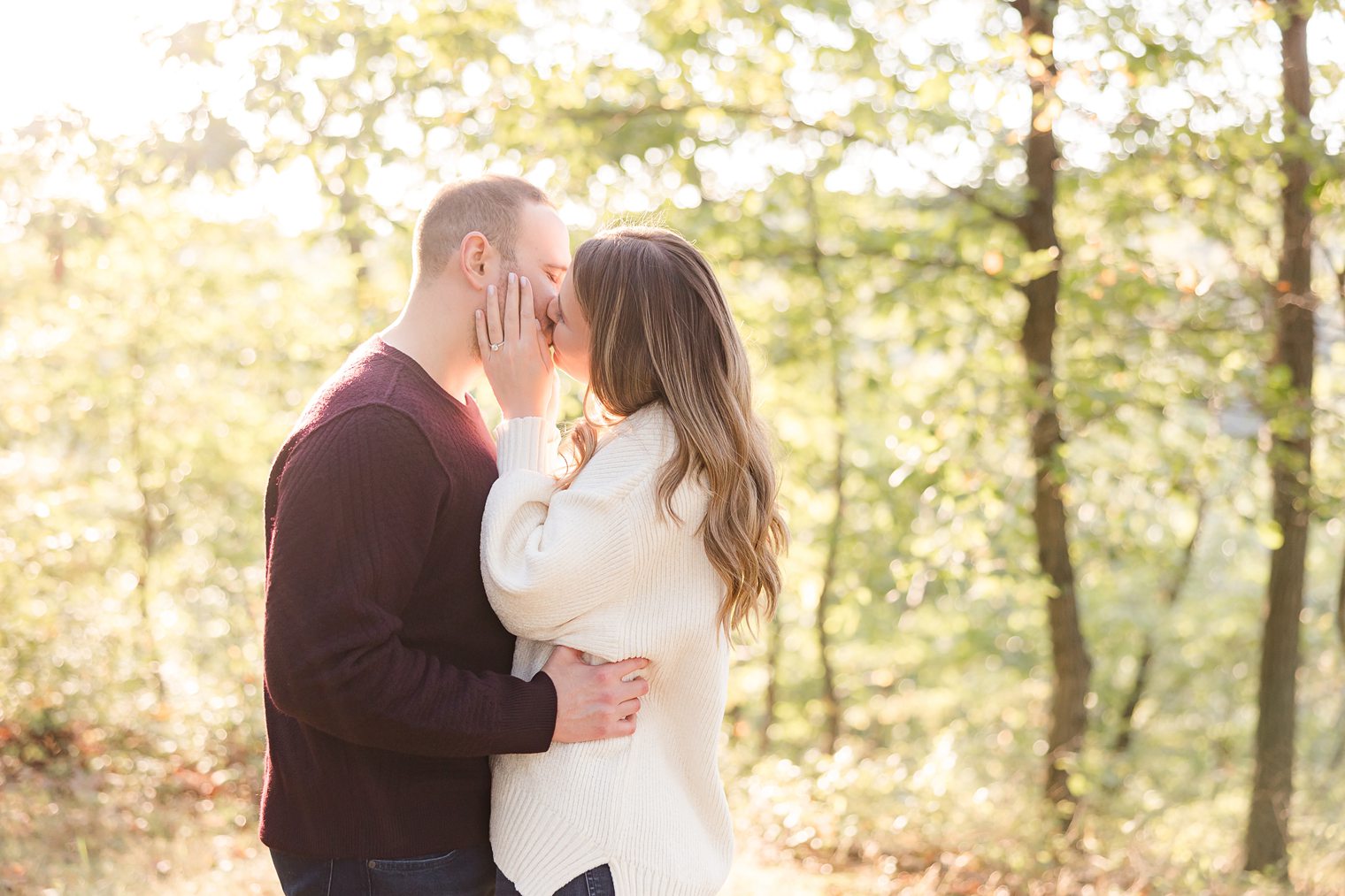 couple kissing at their engagement session in Tallman Mountain State 