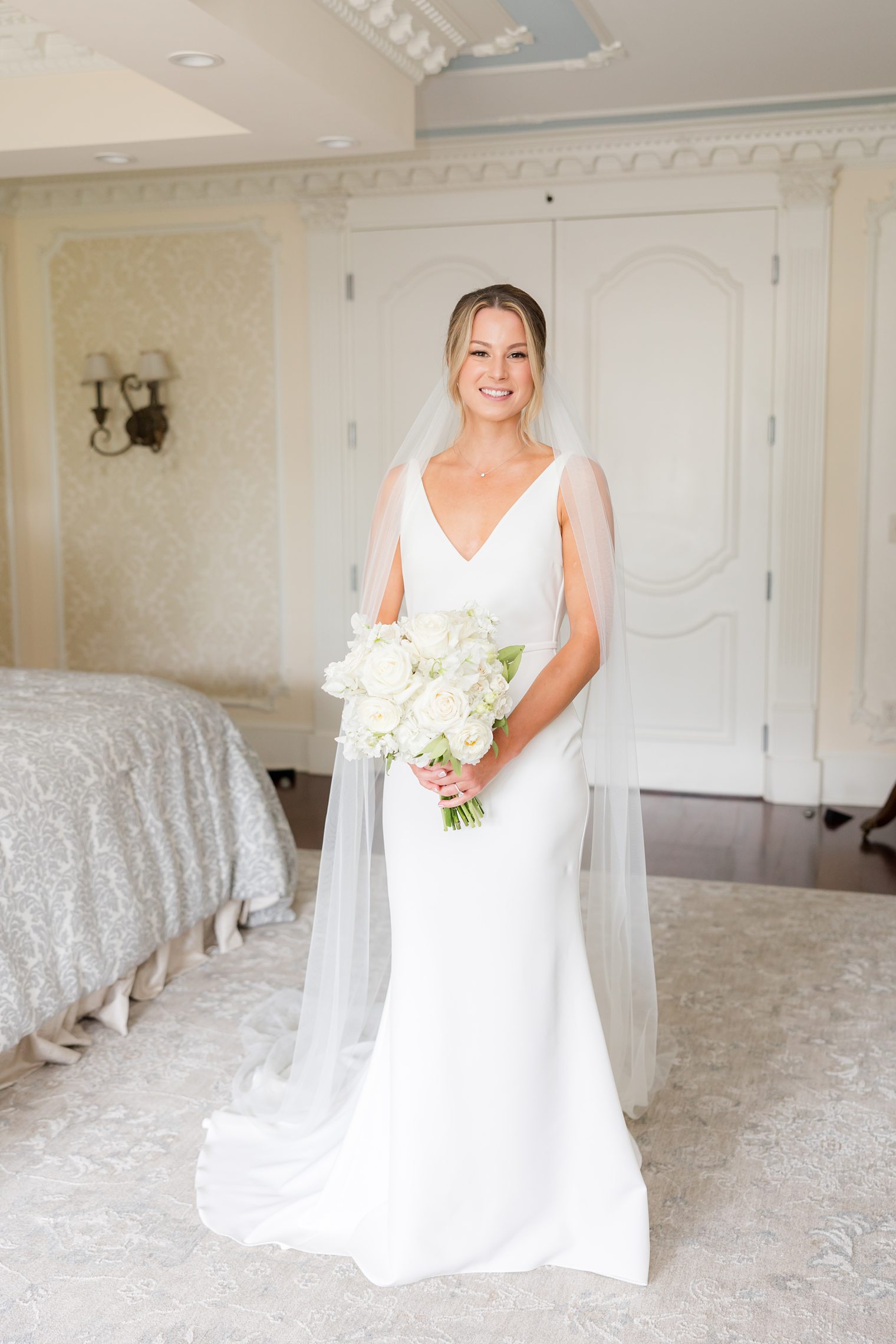 bride modeling wiht her bouquet 