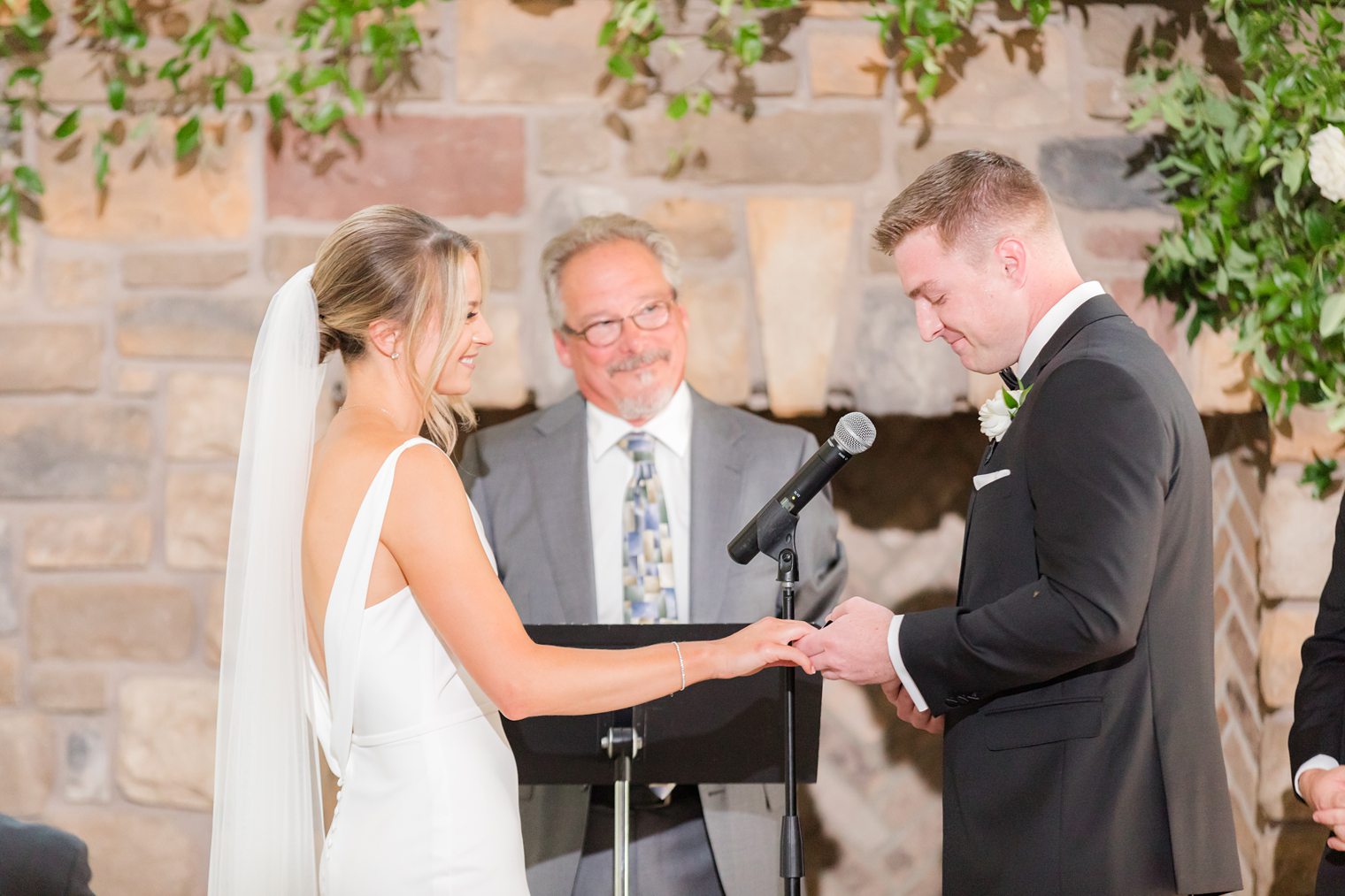 groom and bride before saying I do in the aisle