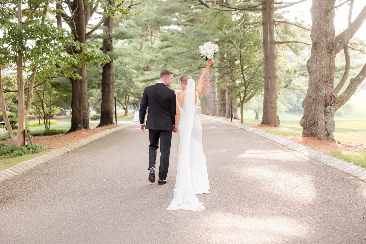 bride holding up her bouquet