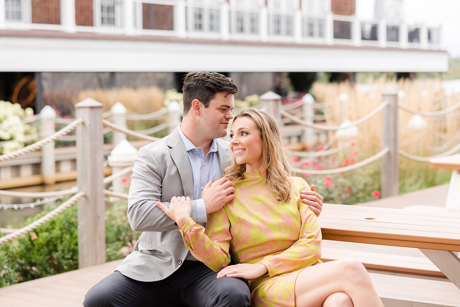 future husband and wife sitting, future husband looking to his bride face 