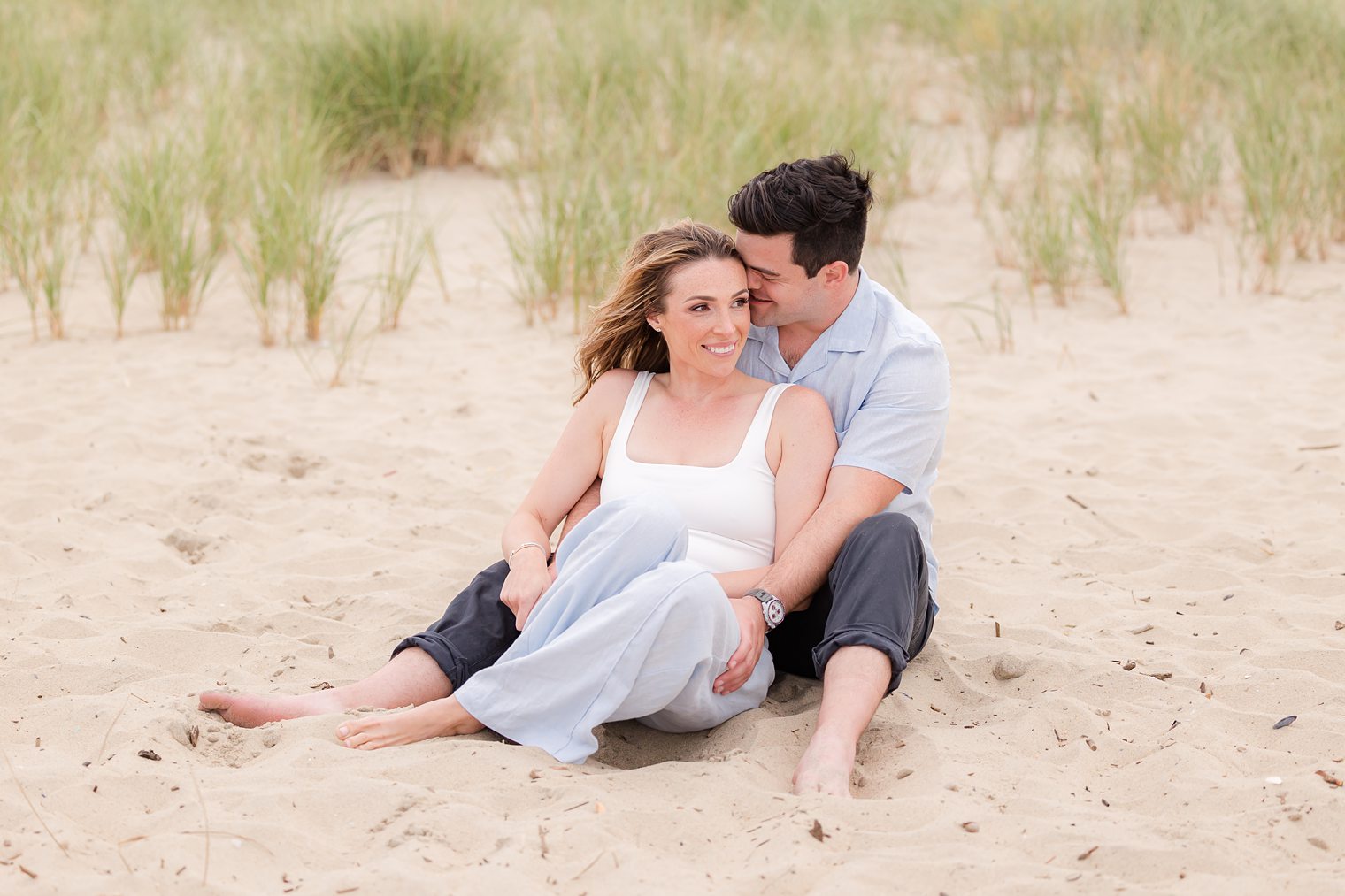 happy couple enjoying their engagement session