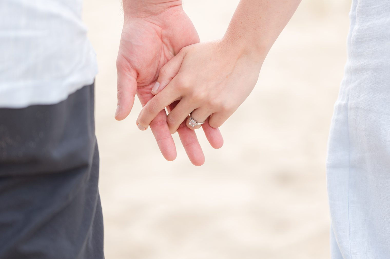 future husband and wife holding hands