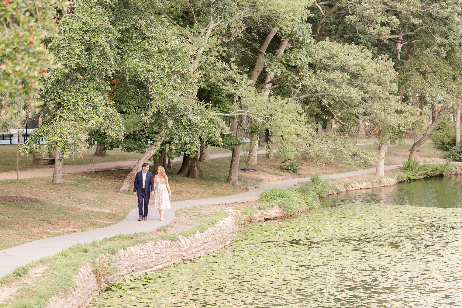 future Mr and Mrs walking aroun the Spring Lake