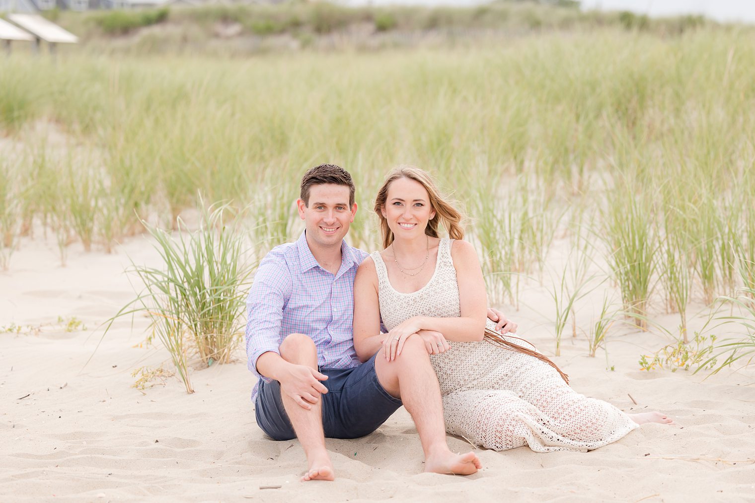 future husband and wife posing for their engagement album