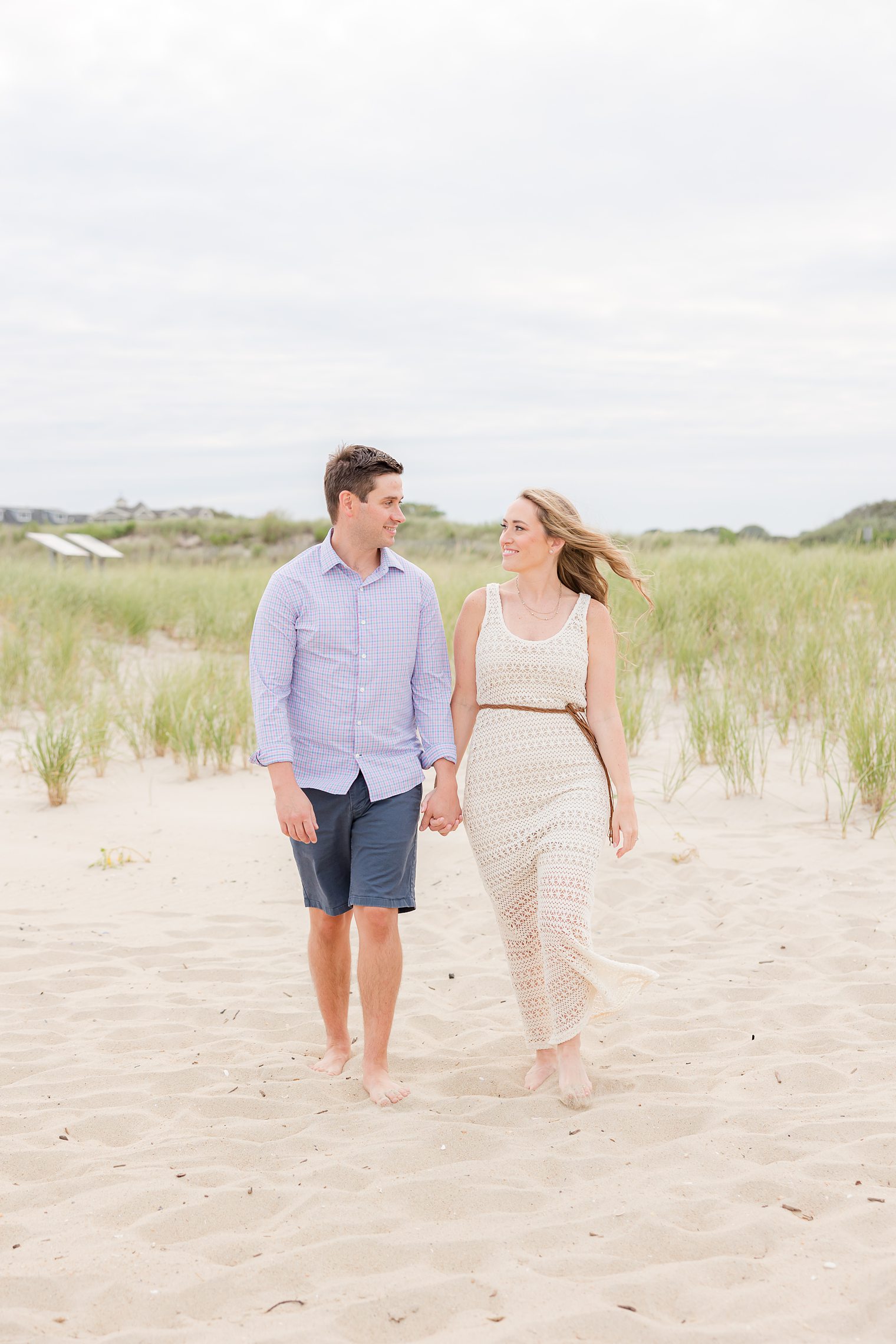 bride and fiancé looking each other romantically 