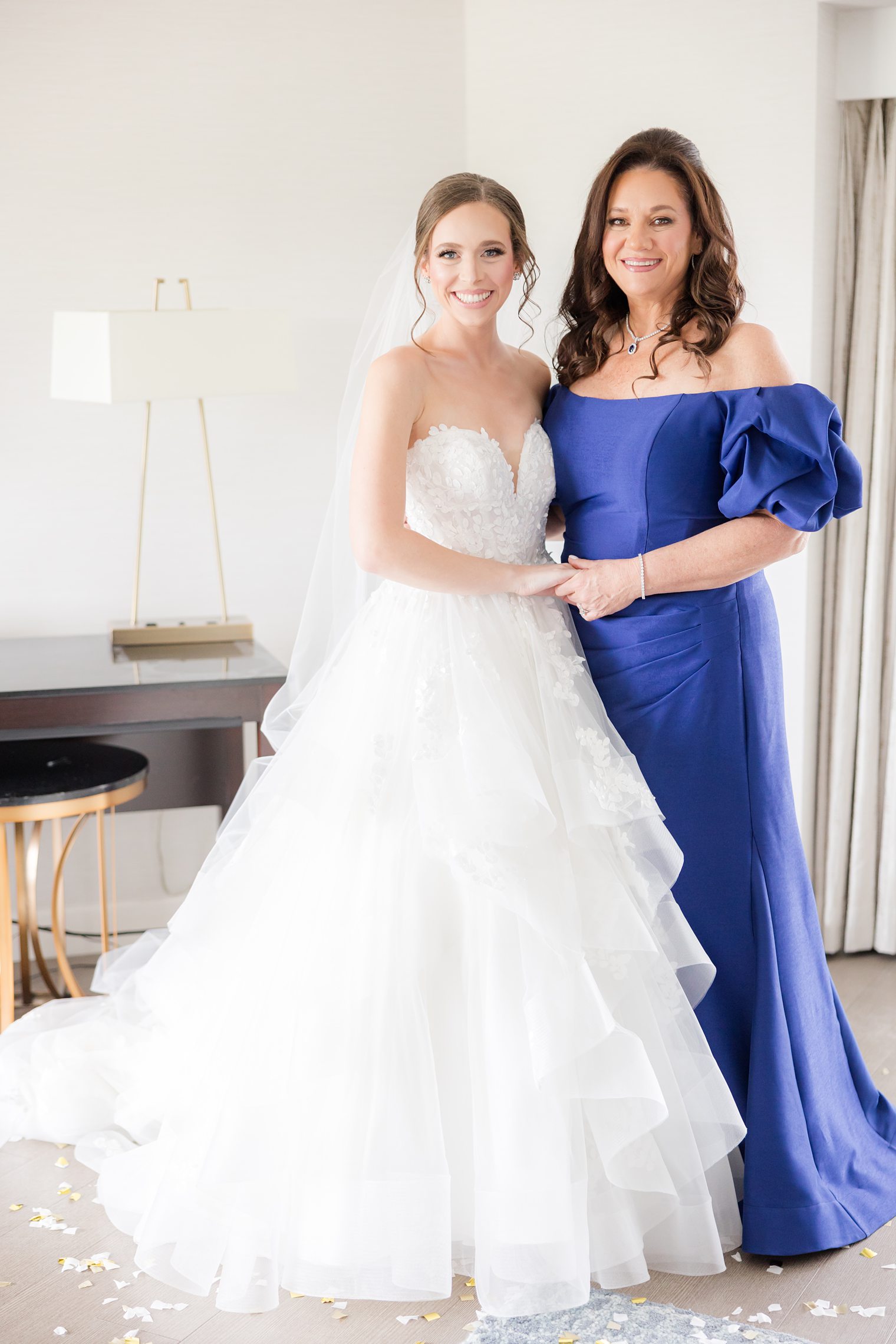 Mother and bride posing for the wedding session