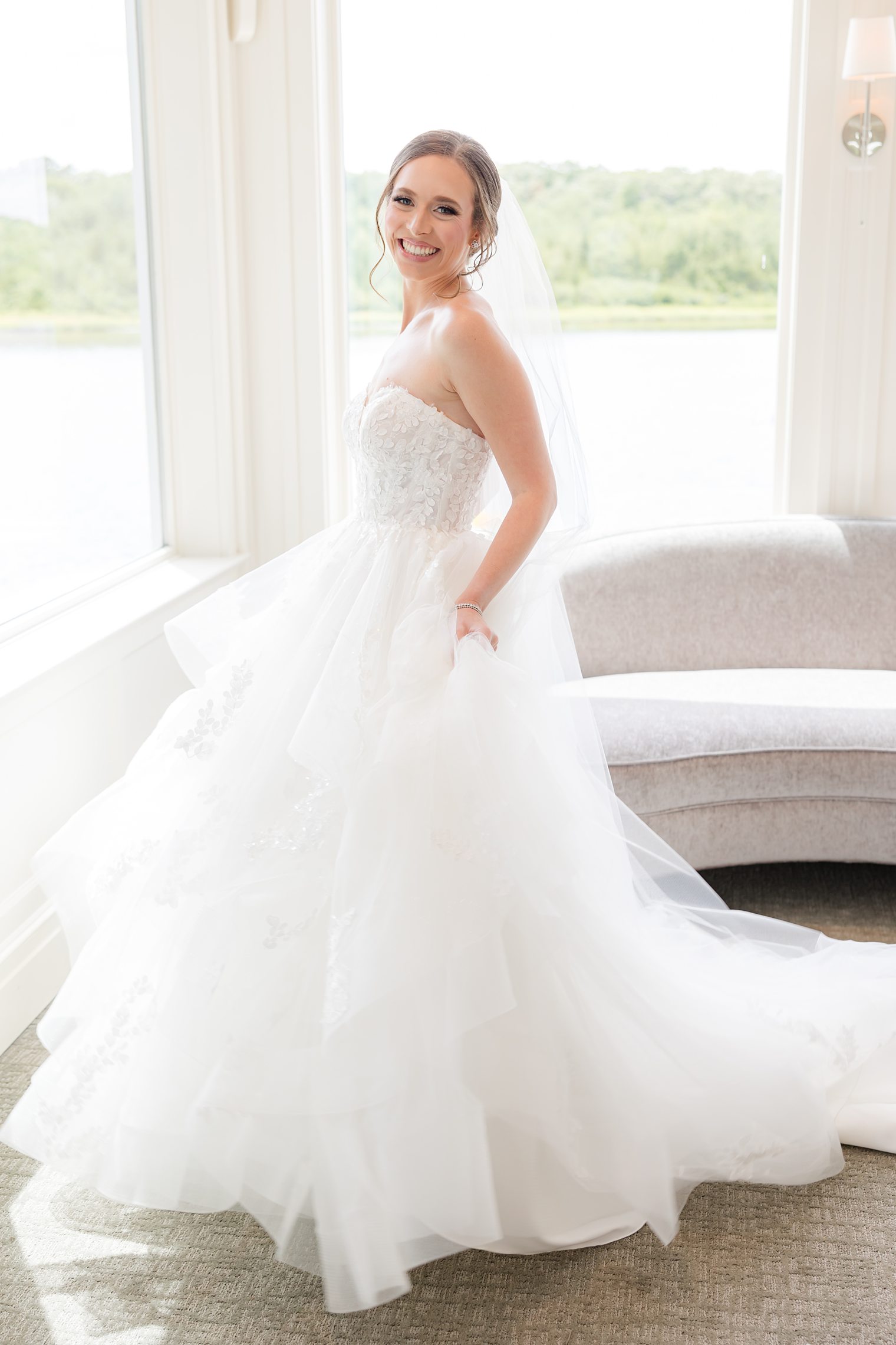 beautiful bride modeling her wedding dress