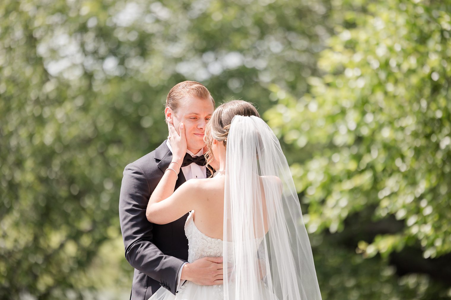 bride holding up his fiancé's head