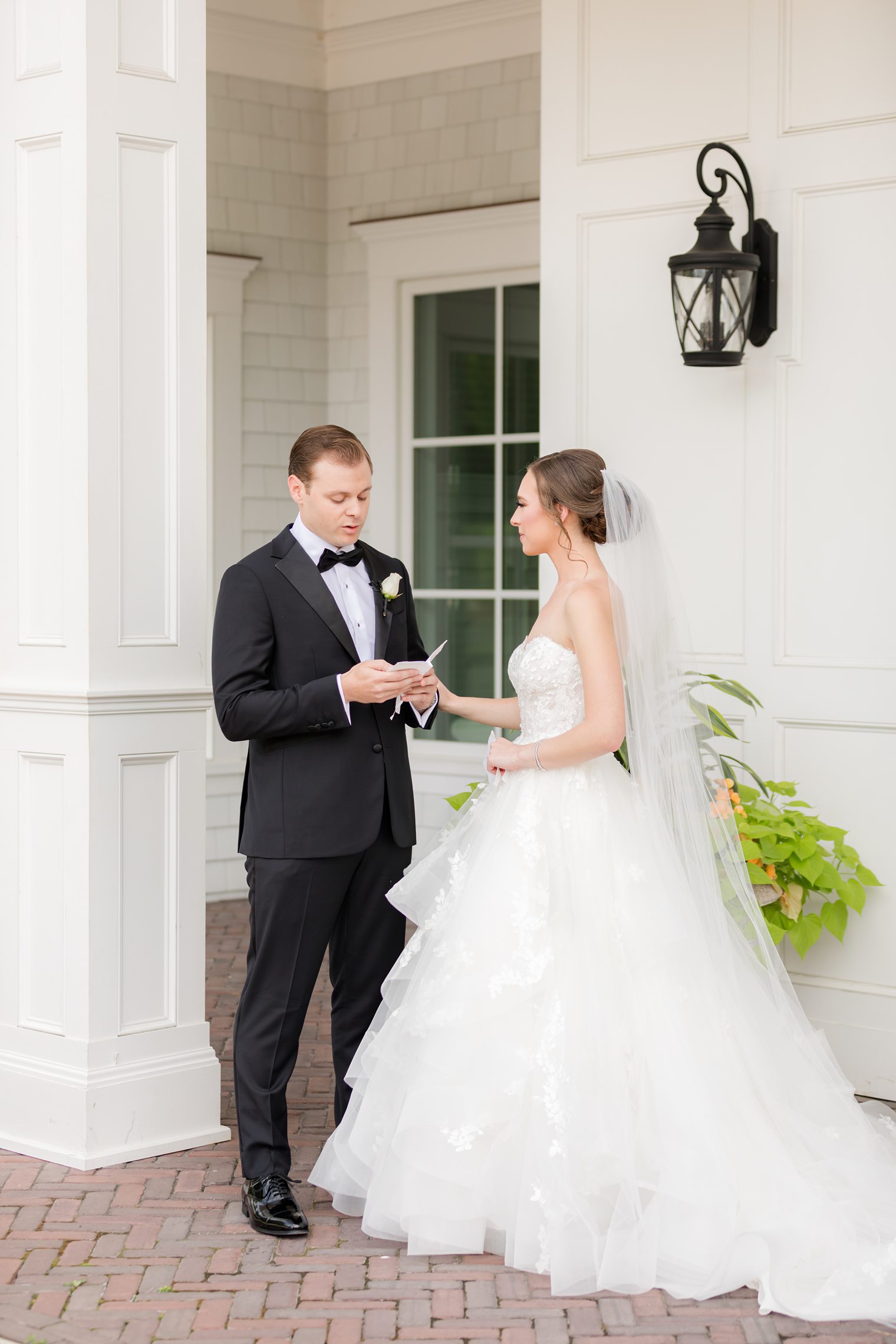 future husband and wife exchanging votes at the mill lakeside manor