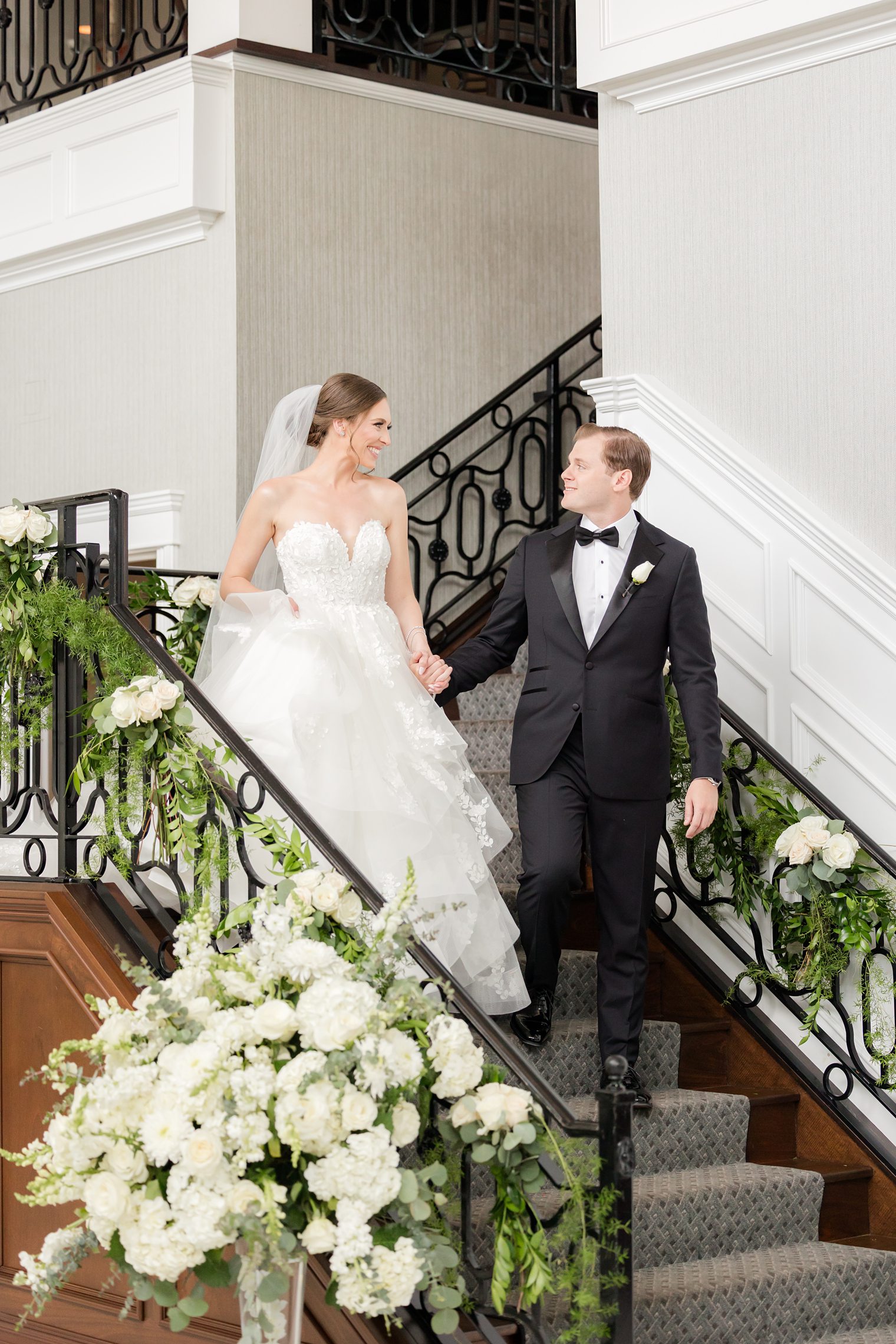 Mr. and Mrs. posing in the stairs