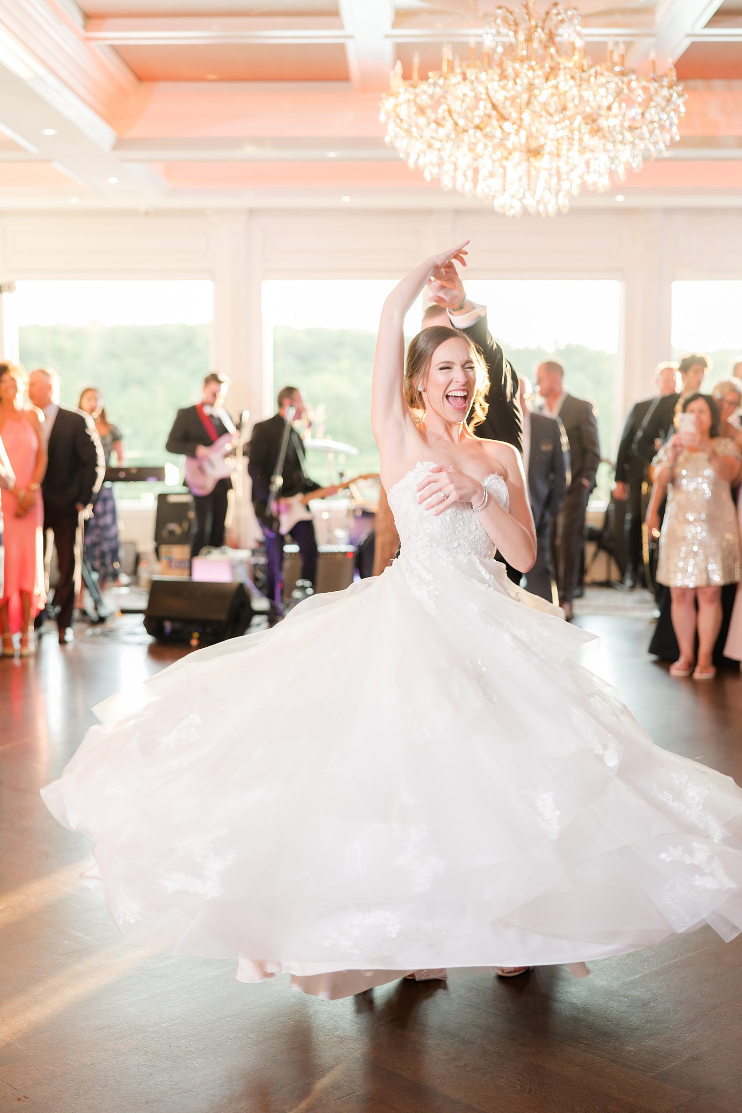 happy bride enjoying their first dance as husband and wife