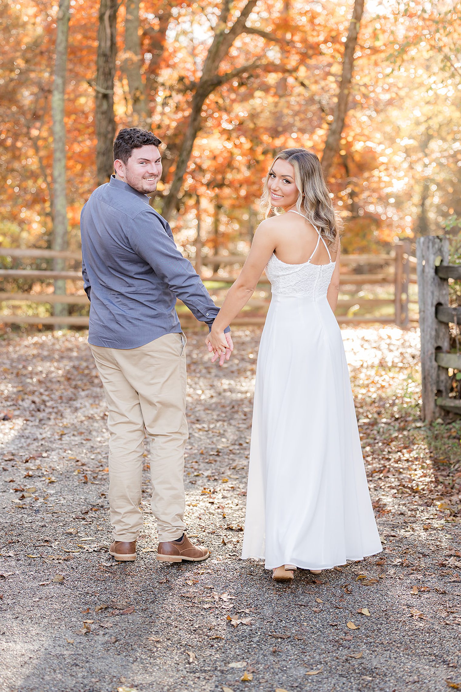 beautiful couple looking to the camera while walking away