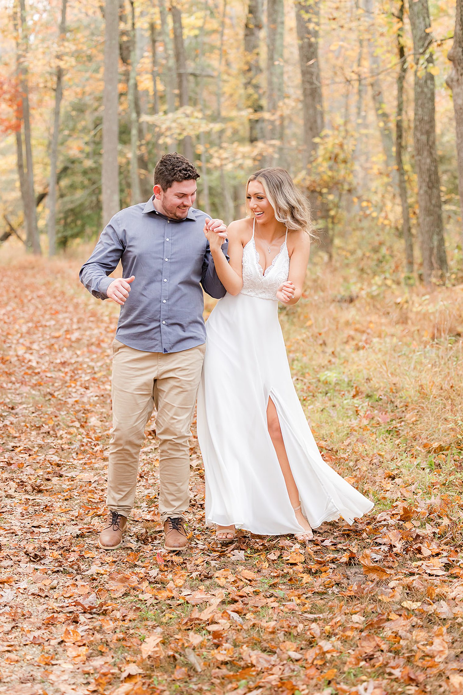 couple dancing in their engagement session at Allaire State Park