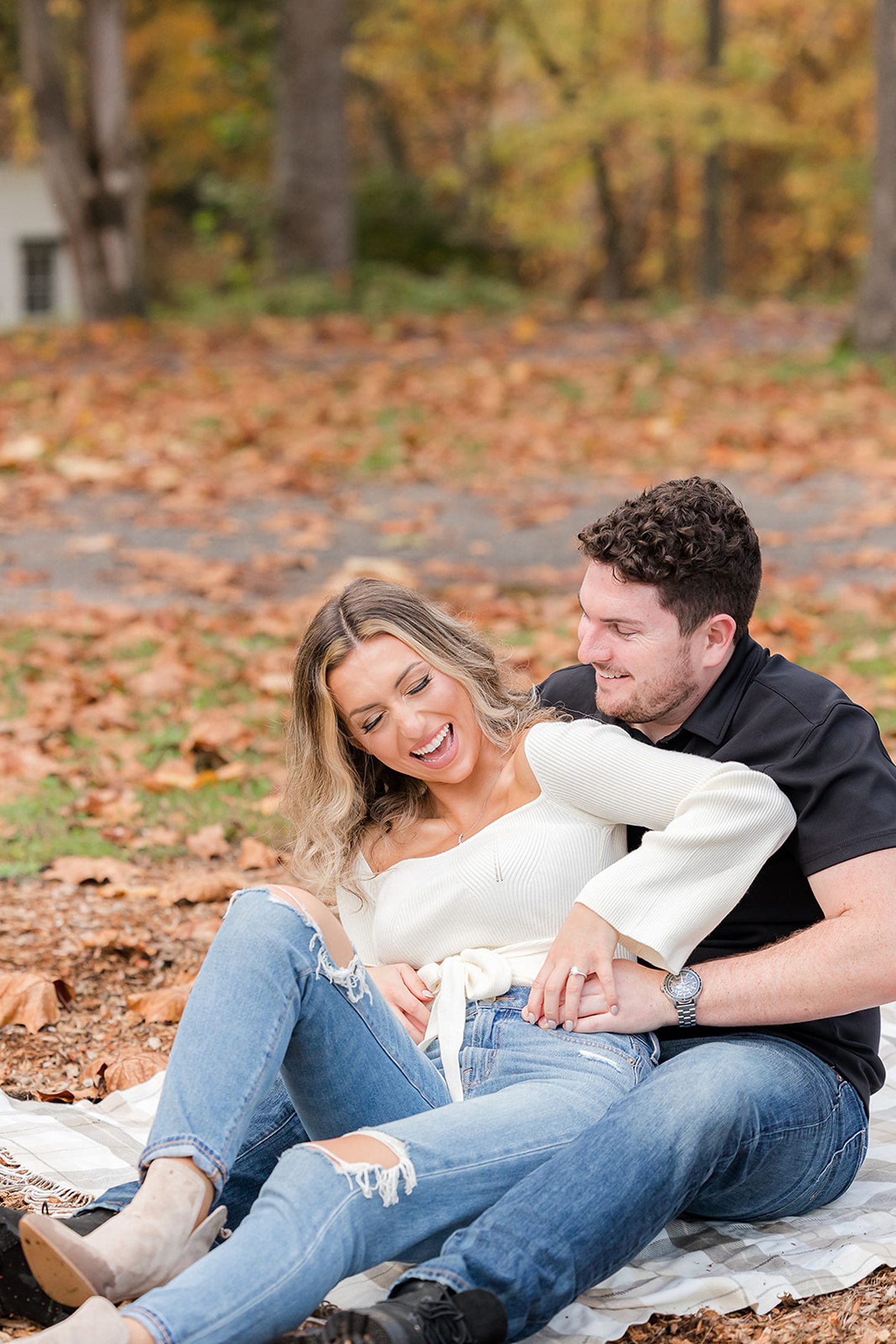 beautiful playful couple having fun during their engagement session
