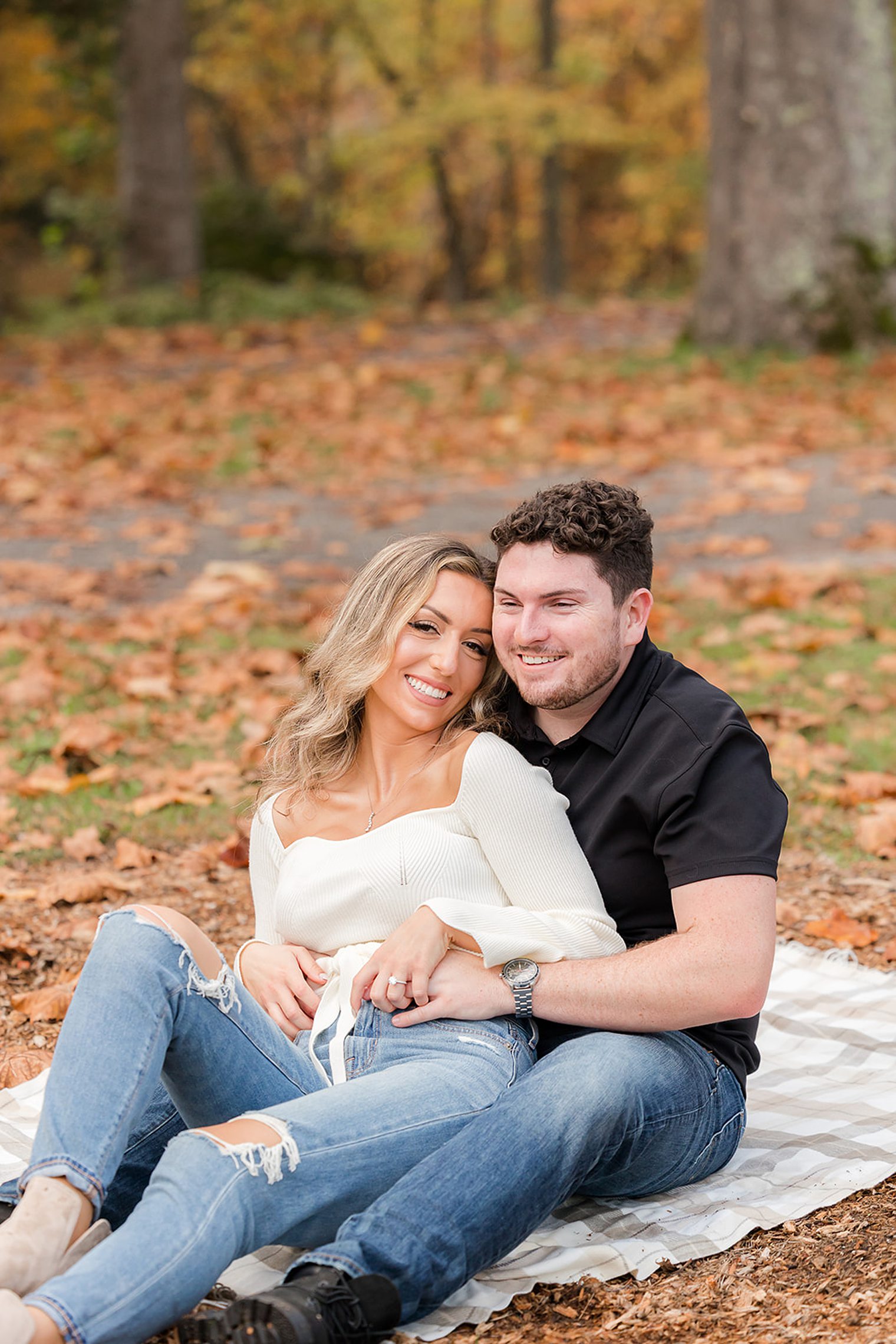 bride and fiancé smiling to the camara 