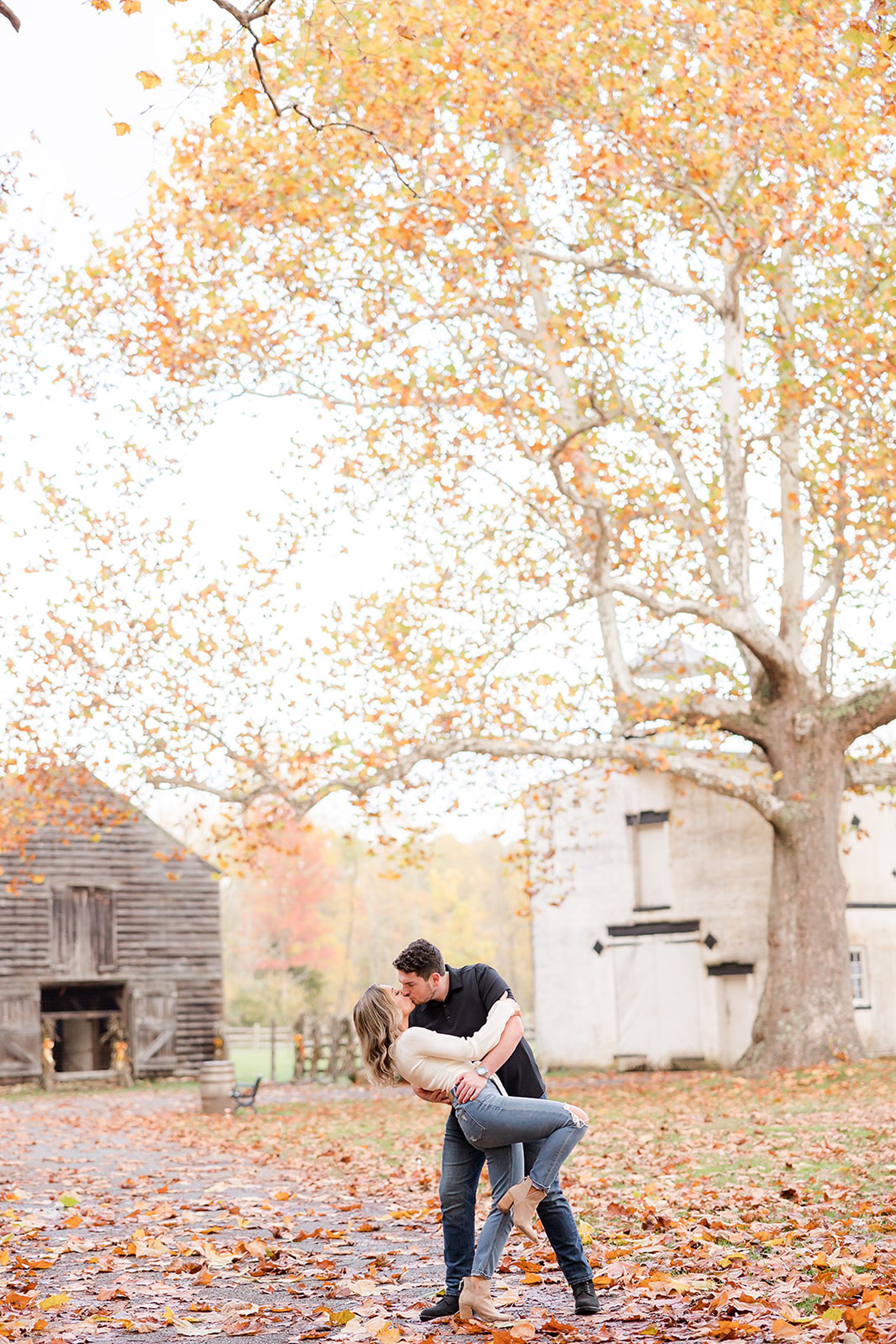 beautiful couple sharing a kiss, while future husband hugs his bride 