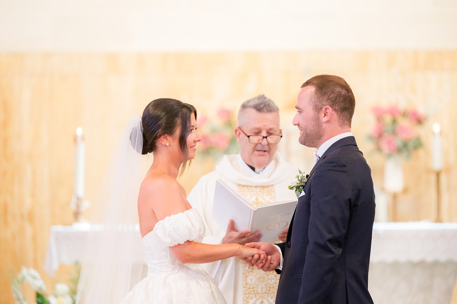 Bride and groom looking each other with happiness 