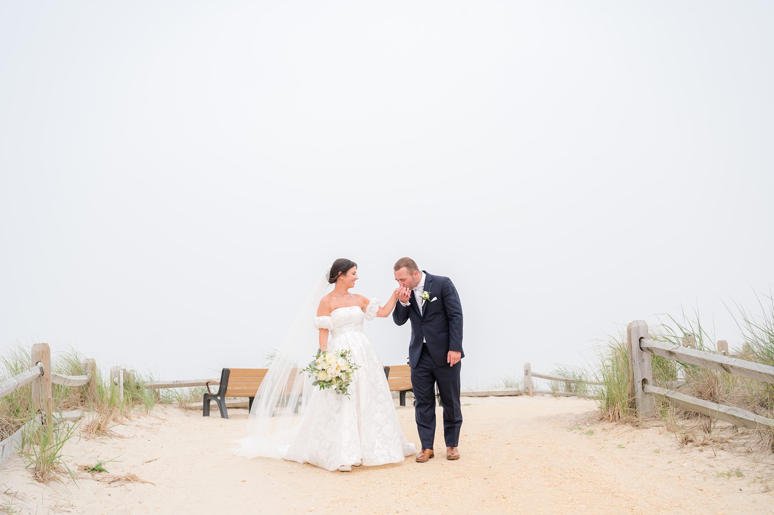 husband kissing his wife hand