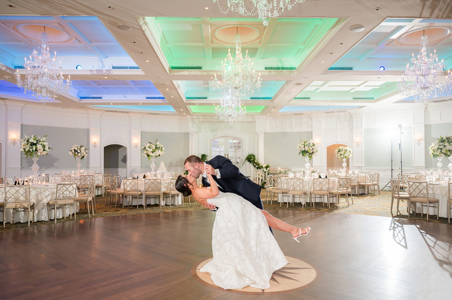 husband and wife sharing a kiss on the dance floor