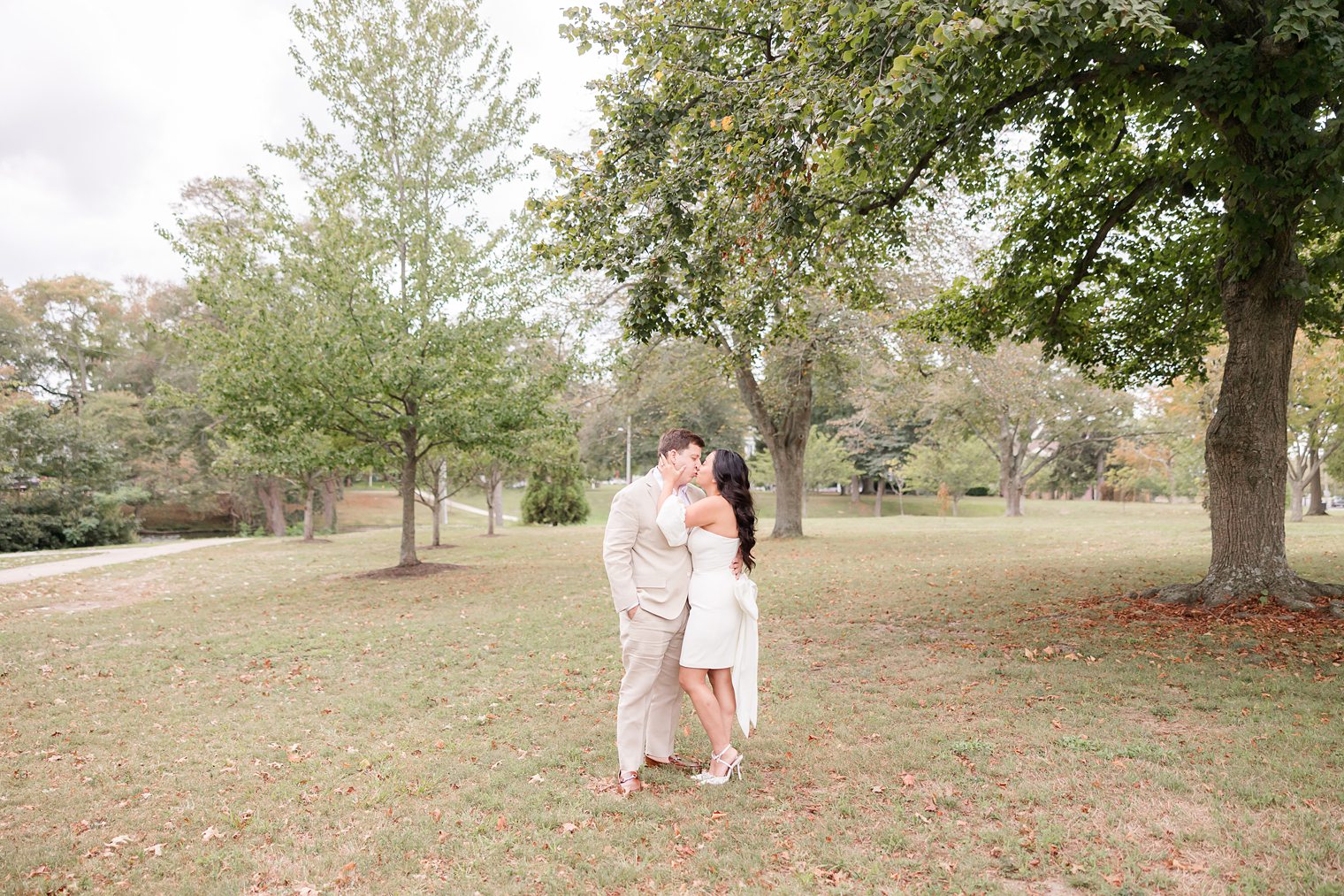 fiancé and bride sharing a kiss 