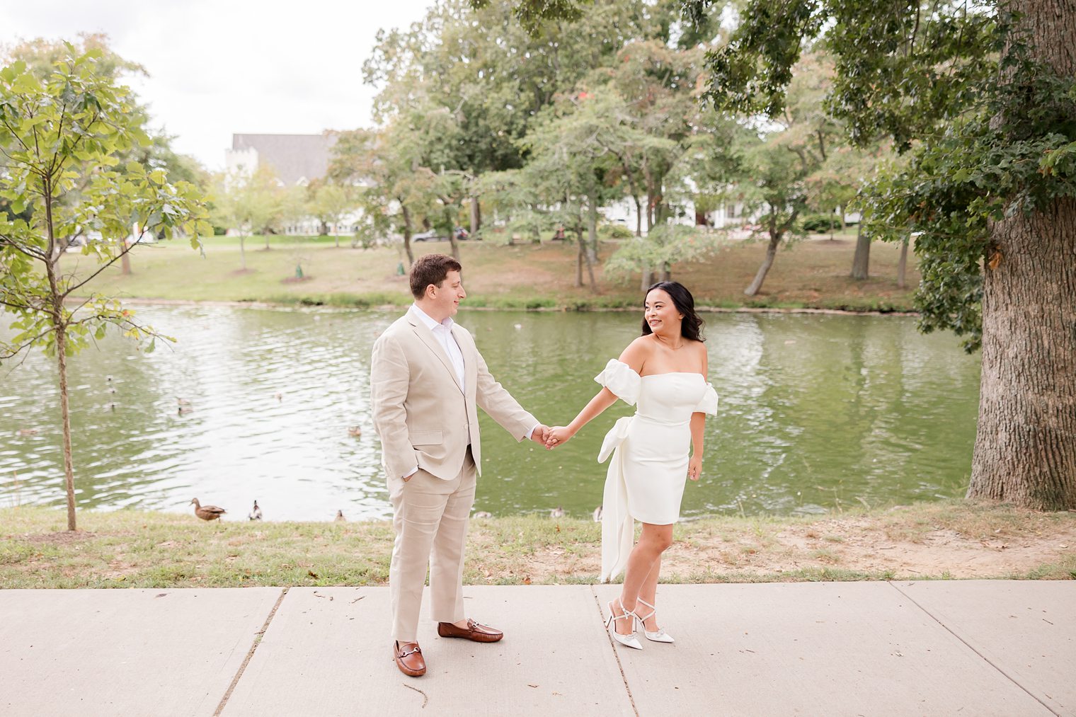 fiancé and bride posing for their engagement session 