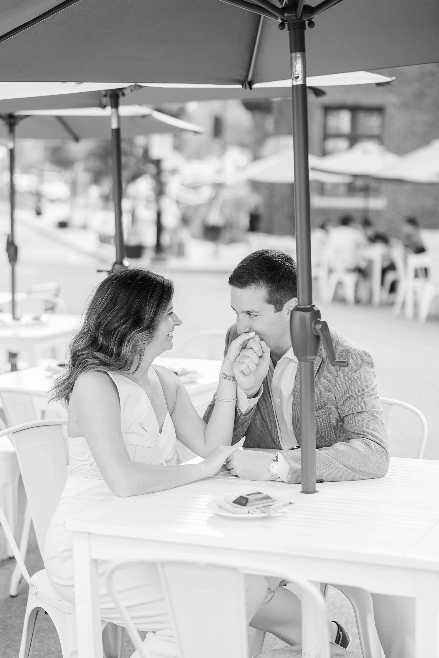 fiancé kissing his bride hand