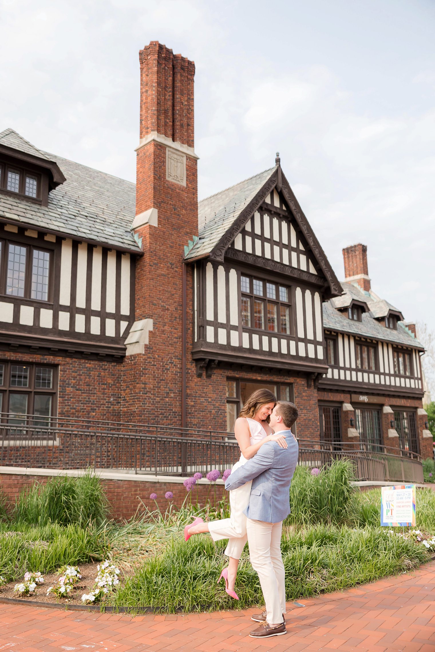 future husband holding up to his future wife at Westport Connecticut 